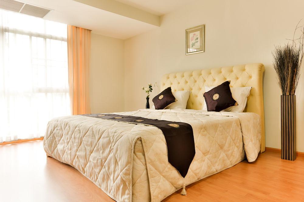The Capital Resort @ Sukhumvit 50 Bangkok Luaran gambar A bedroom at the hotel