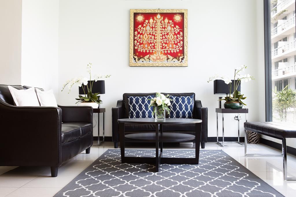 The Capital Resort @ Sukhumvit 50 Bangkok Luaran gambar A living room in a condominium